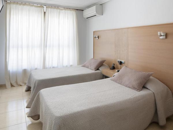 Hotel Alamo : photo 1 de la chambre chambre lits jumeaux Économique - vue sur ville