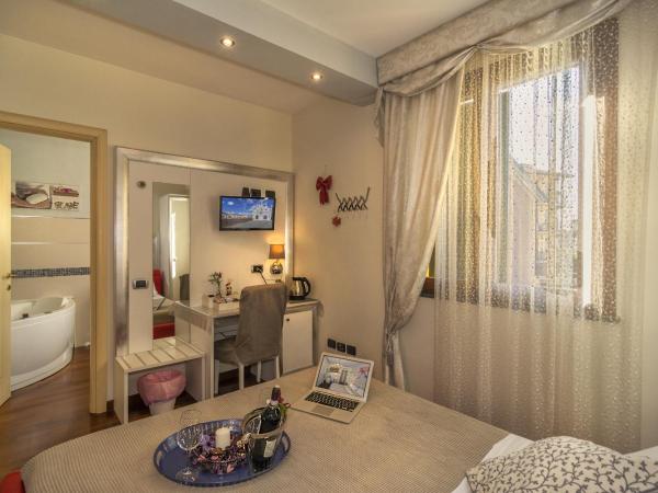 Il Dolce Sospiro : photo 10 de la chambre chambre lit queen-size avec baignoire spa