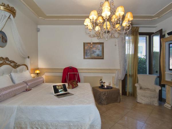 Il Dolce Sospiro : photo 9 de la chambre chambre lit king-size - vue sur jardin