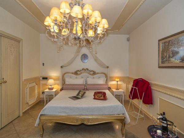 Il Dolce Sospiro : photo 6 de la chambre chambre lit king-size - vue sur jardin