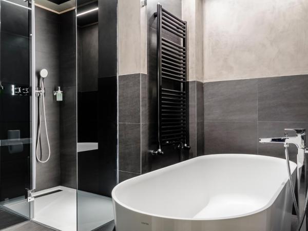 Hotel Metropolis : photo 8 de la chambre suite lit king-size