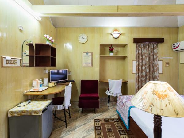 Sonnetta Residency : photo 3 de la chambre chambre double standard avec ventilateur