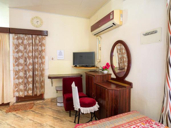 Sonnetta Residency : photo 4 de la chambre chambre familiale supérieure