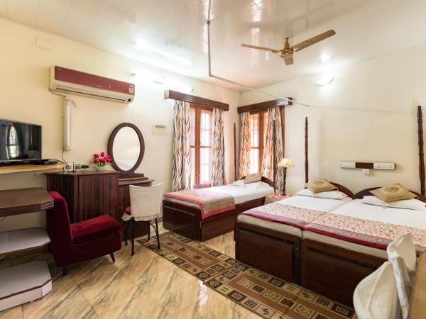 Sonnetta Residency : photo 3 de la chambre chambre familiale supérieure