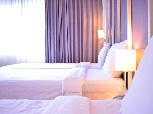 Trang Hotel Bangkok - SHA Plus : photo 3 de la chambre chambre triple deluxe