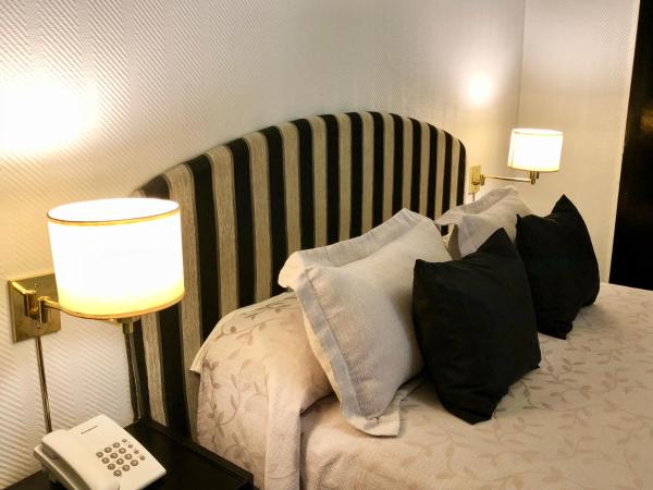 Hotel La Perla : photo 1 de la chambre chambre lits jumeaux/double
