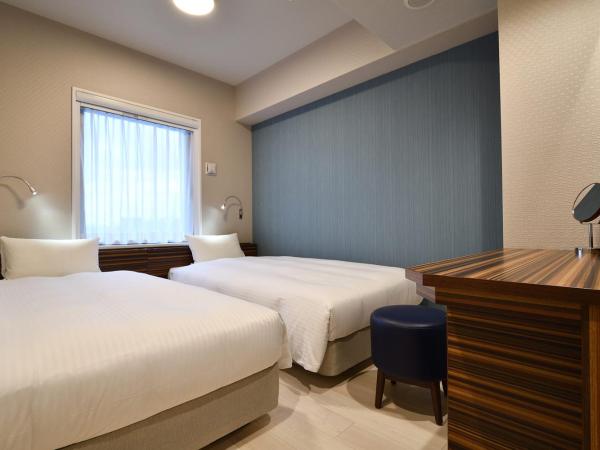 The BREAKFAST HOTEL Fukuoka Nakasu : photo 1 de la chambre chambre lits jumeaux standard - non-fumeurs