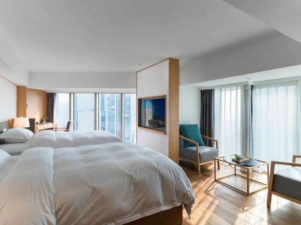 Bai Yun Qin She Boutique : photo 2 de la chambre chambre lits jumeaux deluxe - vue sur ville