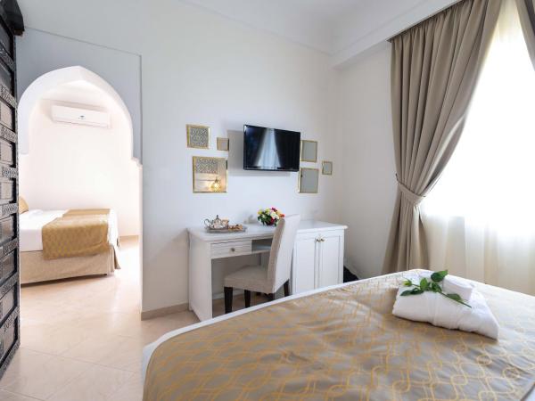 Marrakech Ryads Parc All inclusive : photo 2 de la chambre chambre quadruple