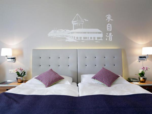 Hotel Schweizerhof Luzern : photo 2 de la chambre chambre double ou lits jumeaux deluxe - vue sur ville