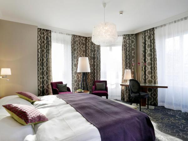 Hotel Schweizerhof Luzern : photo 1 de la chambre chambre double ou lits jumeaux deluxe - vue sur ville