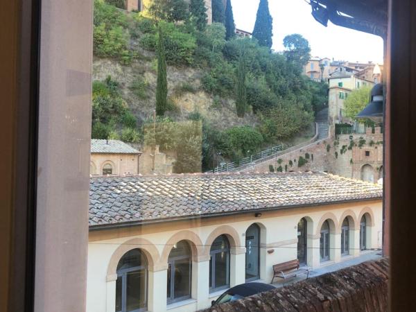 Siena Vip B&B : photo 9 de la chambre studio lit king-size