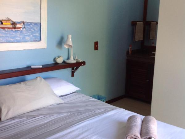 Suite Em Buzios JoãO Fernandes Praia : photo 10 de la chambre chambre double - vue sur jardin