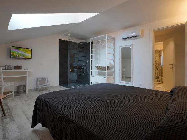 Approdo 36 : photo 4 de la chambre suite familiale