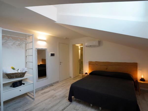 Approdo 36 : photo 4 de la chambre chambre double ou lits jumeaux avec salle de bains privative