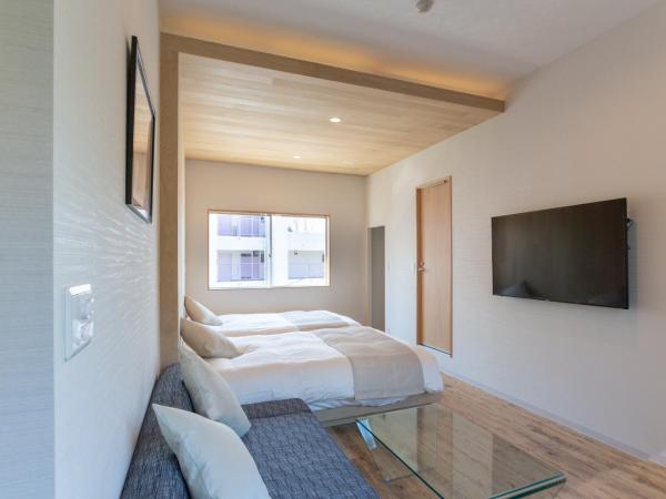 Sakura Cross Hotel Shinjuku East : photo 1 de la chambre chambre double avec balcon