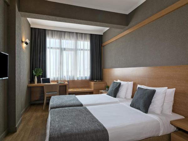 Porto Palace Hotel Thessaloniki : photo 3 de la chambre chambre familiale