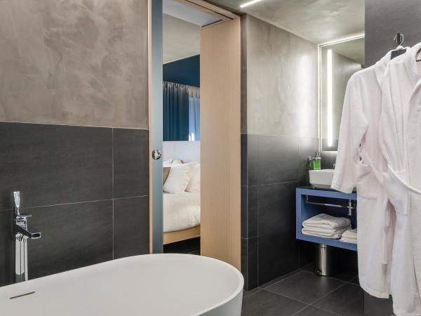 Hotel Metropolis : photo 9 de la chambre suite lit king-size