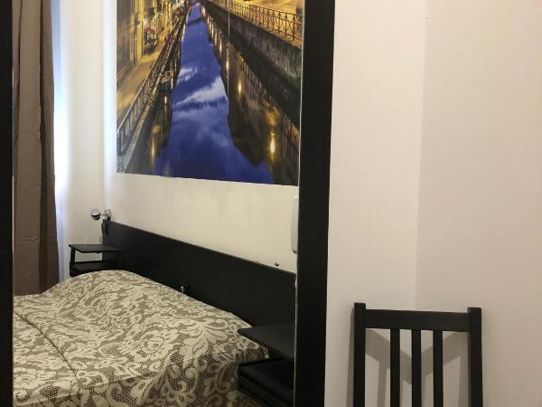 Albergo Corvetto Corso Lodi : photo 8 de la chambre chambre double ou lits jumeaux avec salle de bains commune