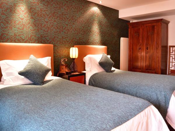 Jingshan Garden Hotel : photo 3 de la chambre chambre lits jumeaux - vue sur cour