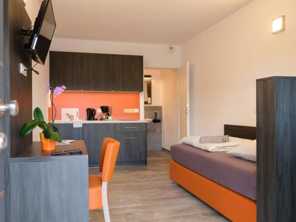 Apartments A7 : photo 3 de la chambre chambre simple avec salle de bains 