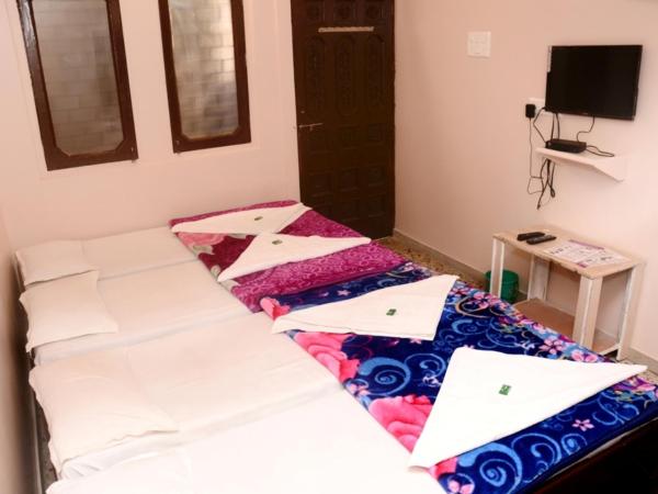 Hotel Parag : photo 9 de la chambre family room with bathroom - indian nationals only