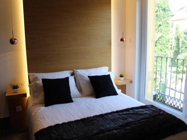 Salamanca Suites Libertad : photo 1 de la chambre suite - vue sur jardin