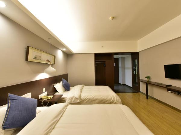Jihao Selected Hotel : photo 1 de la chambre chambre lits jumeaux avec douche