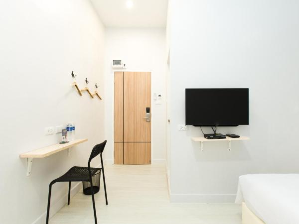 Metro hotel : photo 1 de la chambre chambre lit queen-size supérieure sans fenêtre