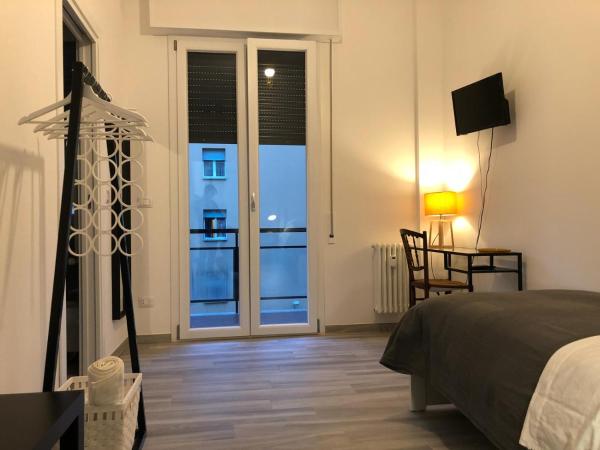 Four Rooms : photo 1 de la chambre chambre simple avec balcon