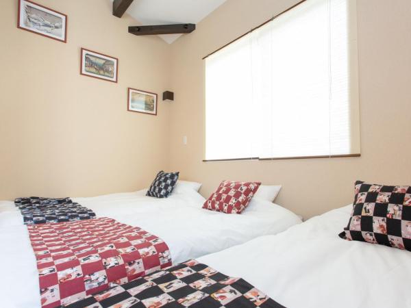 Tourisakuraann 2goukann : photo 4 de la chambre chambre familiale standard