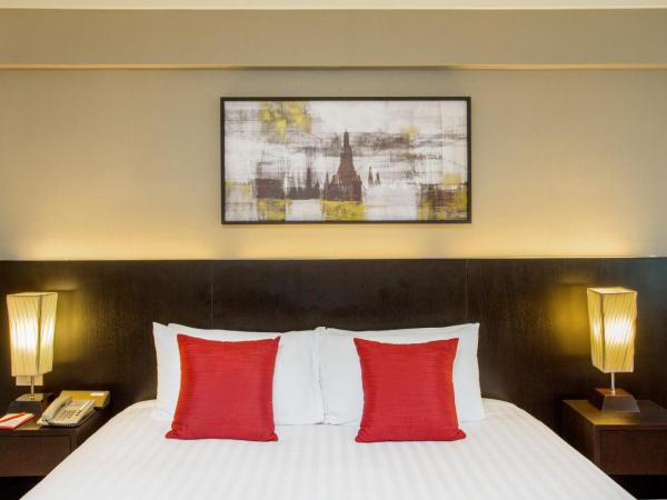 Ramada Plaza by Wyndham Bangkok Menam Riverside : photo 3 de la chambre chambre lit king-size de luxe - vue sur rivière