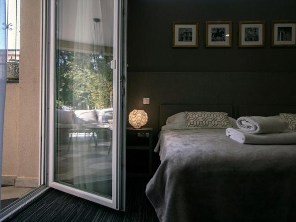 Sundial Boutique Hotel : photo 3 de la chambre chambre double avec lit d'appoint et terrasse