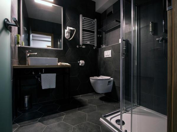 Sundial Boutique Hotel : photo 2 de la chambre chambre double avec lit d'appoint et terrasse