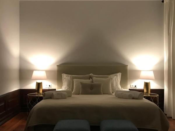 Oryza Guest House& Suites : photo 2 de la chambre suite lit king-size