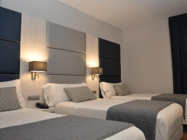 Hotel Selu : photo 1 de la chambre chambre lits jumeaux avec lit d’appoint - 301