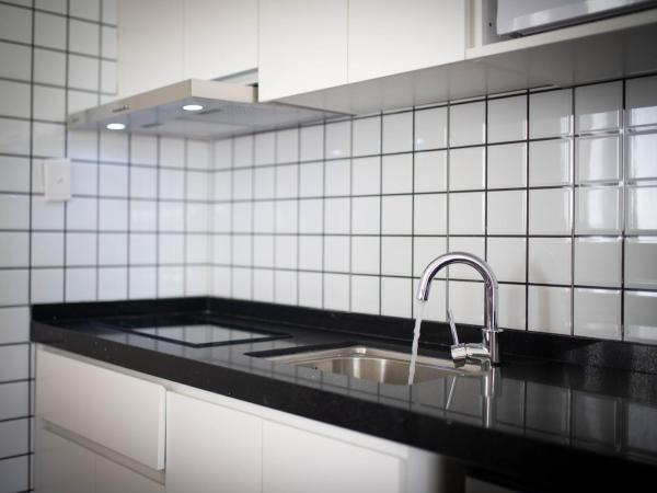 Pupuke Manor Motel : photo 9 de la chambre bungalow familial