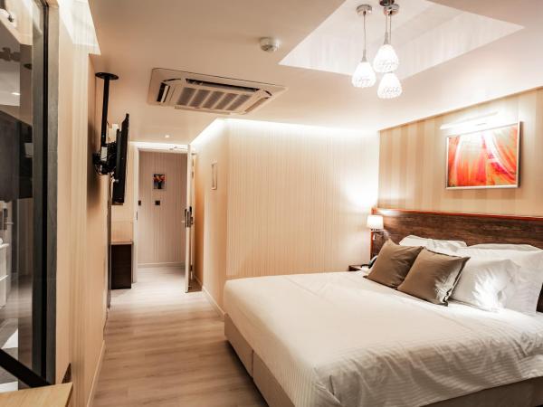 Amina Residency : photo 3 de la chambre chambre lit king-size de luxe supérieure avec balcon