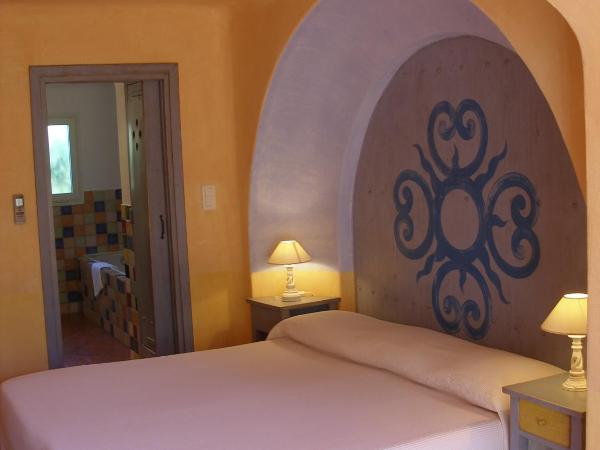 Domaine De Caranella : photo 1 de la chambre chambre double ou lits jumeaux confort avec vue sur jardin