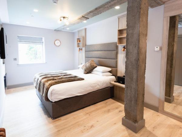 Clarendon Suites : photo 2 de la chambre chambre lit king-size