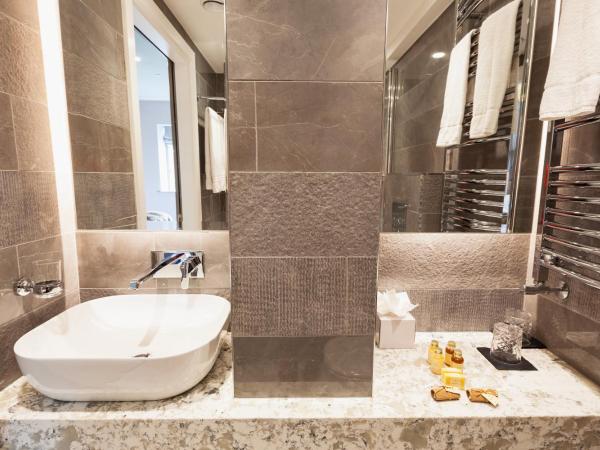 Clarendon Suites : photo 2 de la chambre chambre lit king-size