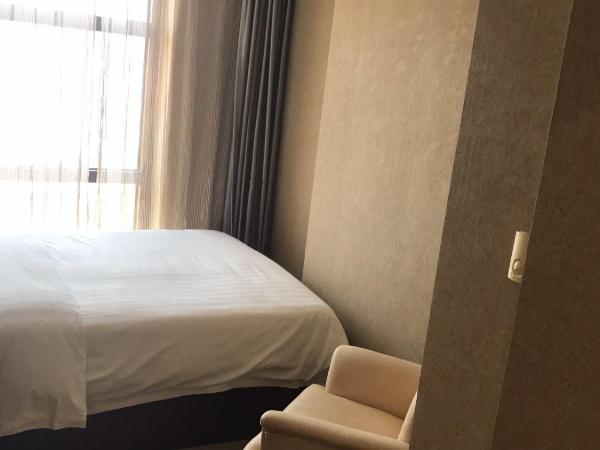 Dalian Asia Pacific Service Apartment (Former Somerset Harbour Court Dalian) : photo 5 de la chambre suite premier deux chambres