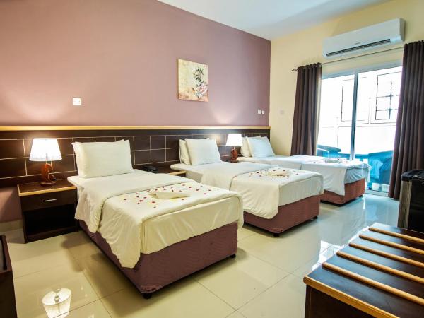 Mutrah Hotel : photo 1 de la chambre chambre triple standard