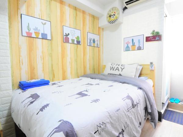 Big Wave Travel : photo 1 de la chambre chambre double standard - vue sur ville