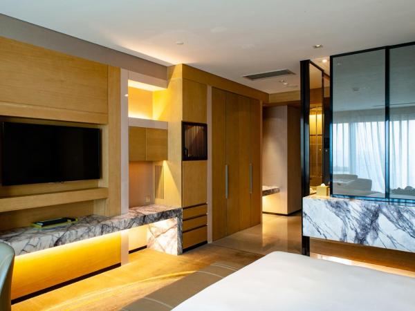 Hyatt Regency Tianjin East : photo 3 de la chambre chambre lit king-size - accès au club