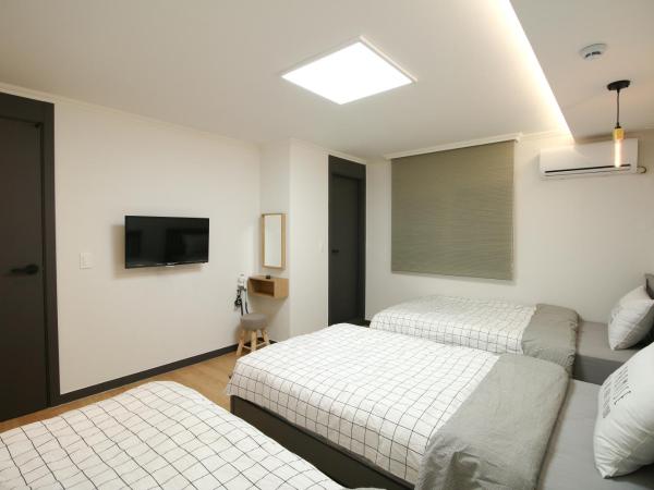 Heima Guesthouse Hongdae : photo 7 de la chambre chambre triple deluxe