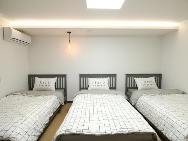 Heima Guesthouse Hongdae : photo 9 de la chambre chambre triple deluxe