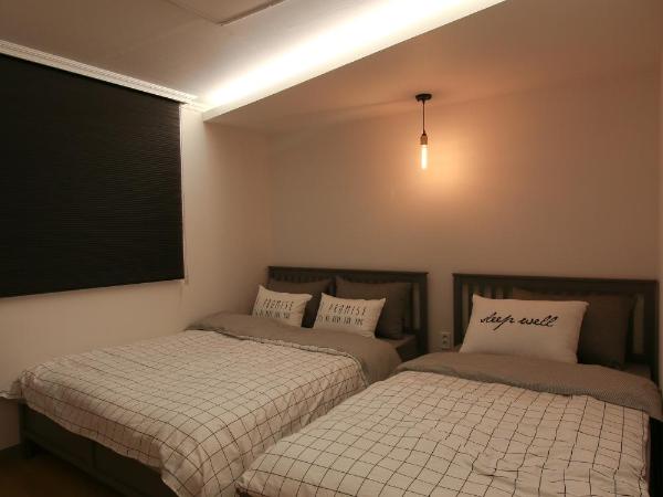 Heima Guesthouse Hongdae : photo 4 de la chambre chambre triple avec salle de bains privative