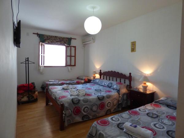 Sayta Hostal : photo 7 de la chambre chambre quadruple avec salle de bains privative