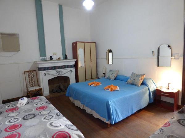 Sayta Hostal : photo 1 de la chambre chambre quadruple avec salle de bains privative